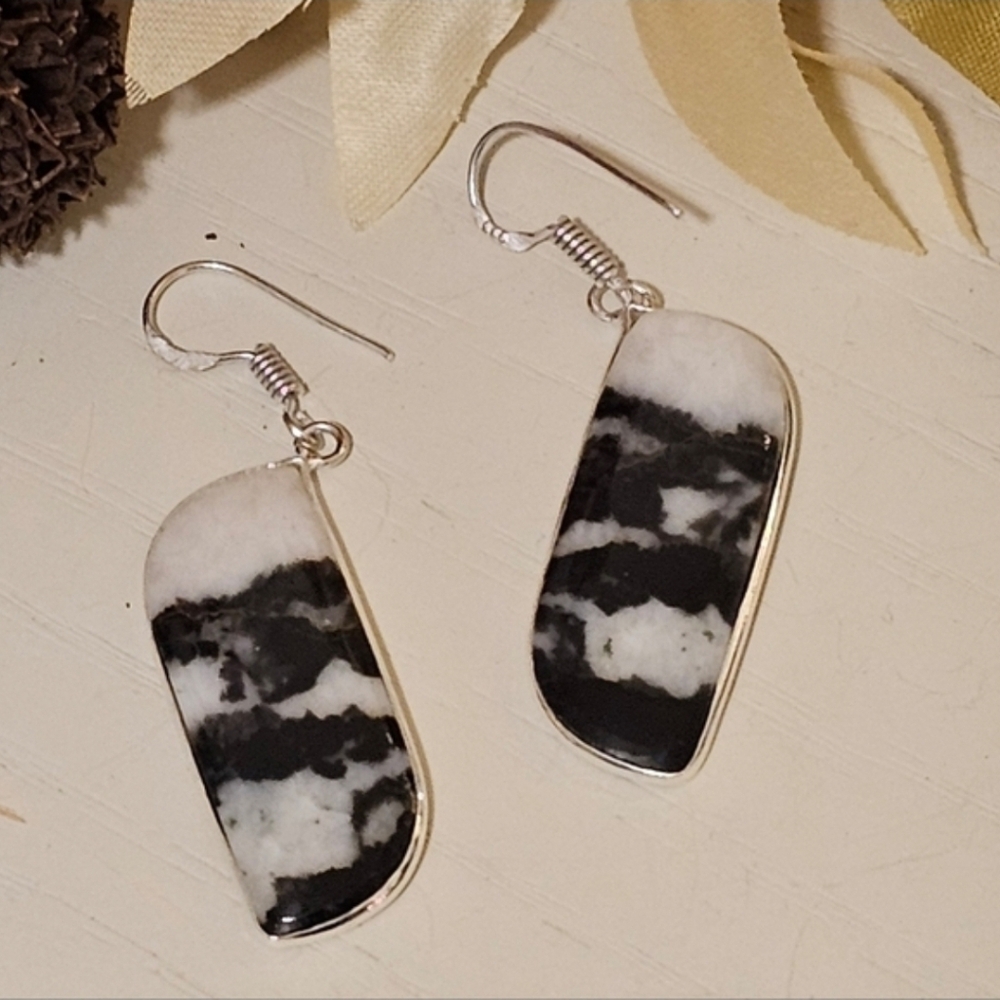 White Buffalo Earrings - represents innocence, purity, and strength